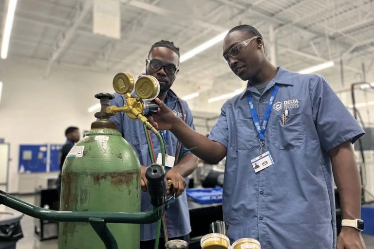 Mentor teaching Mentee HVAC work - Heroes United