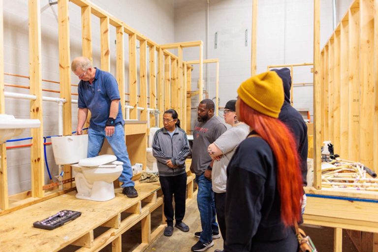 Mentro teach a group of Mentees Plumbing work - Heroes United