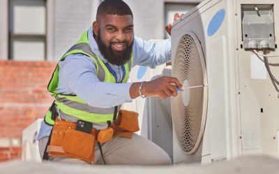 happy Mentee doing HVAC work outside - Heroes United